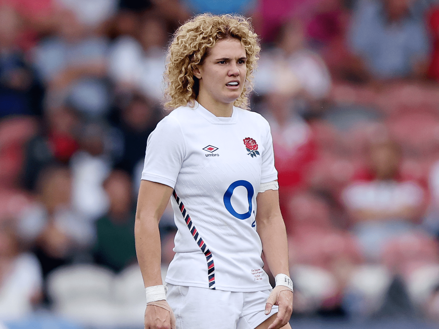 England's Red Roses player Ellie Kildunne standing on the pitch during a match