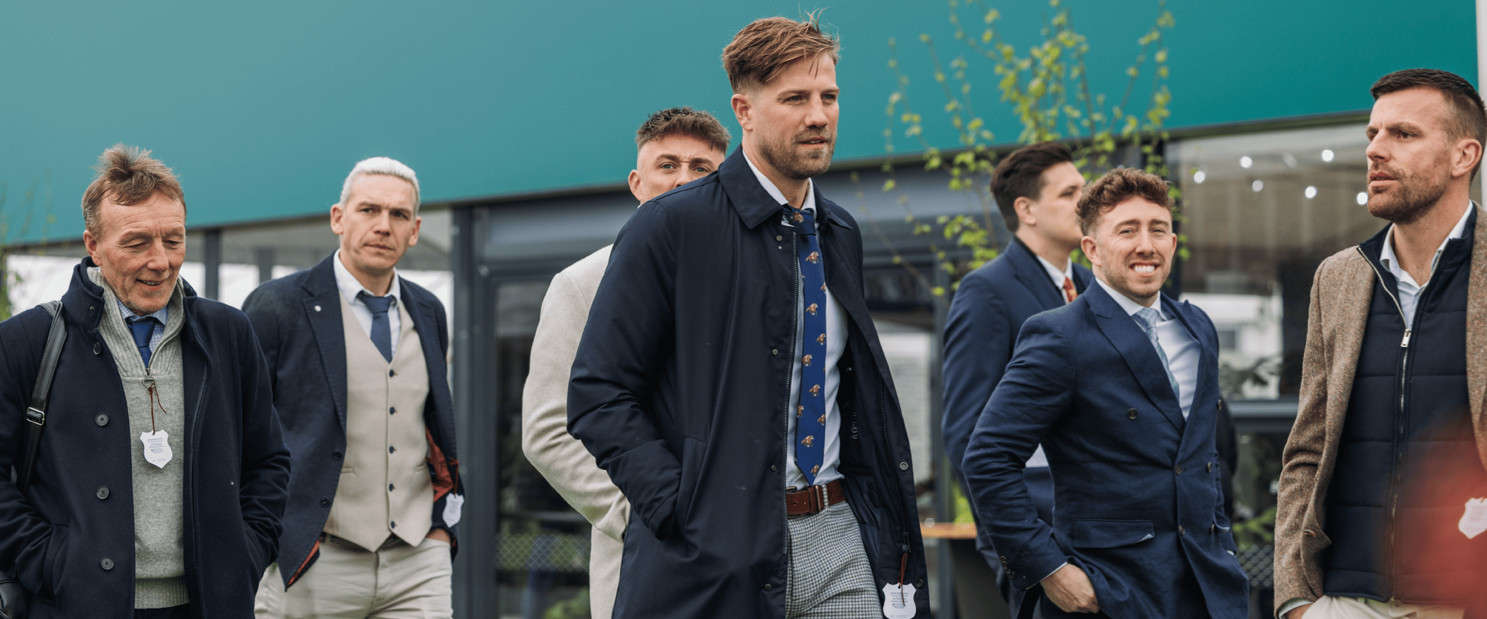 Group of friends walking into Cheltenham Festival for a hospitality experience