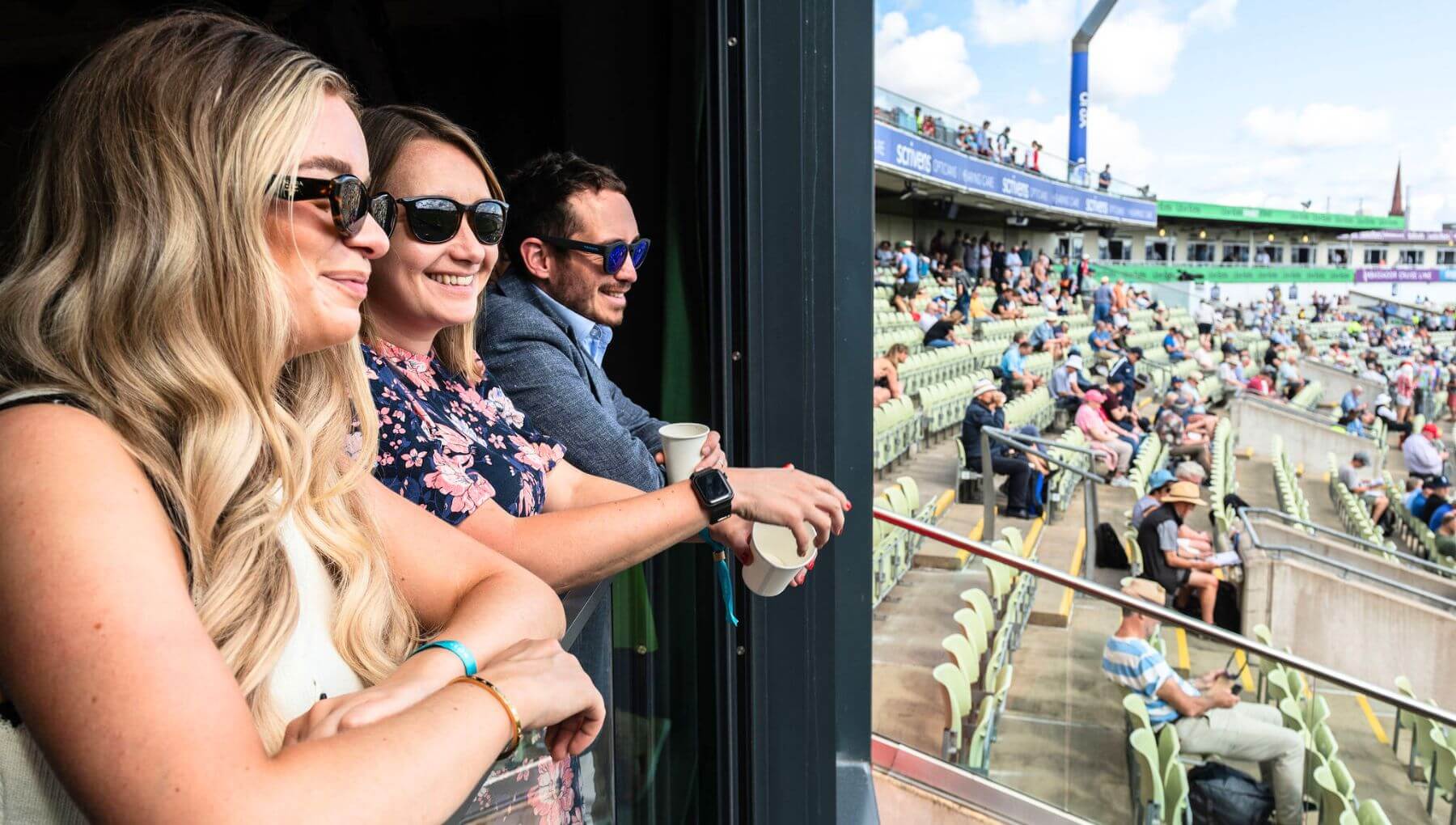 Guests enjoying the cricket from the 501 balcony